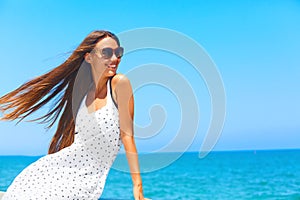 Sea Ã¢â¬â¹Ã¢â¬â¹breeze. Girl with long hair.